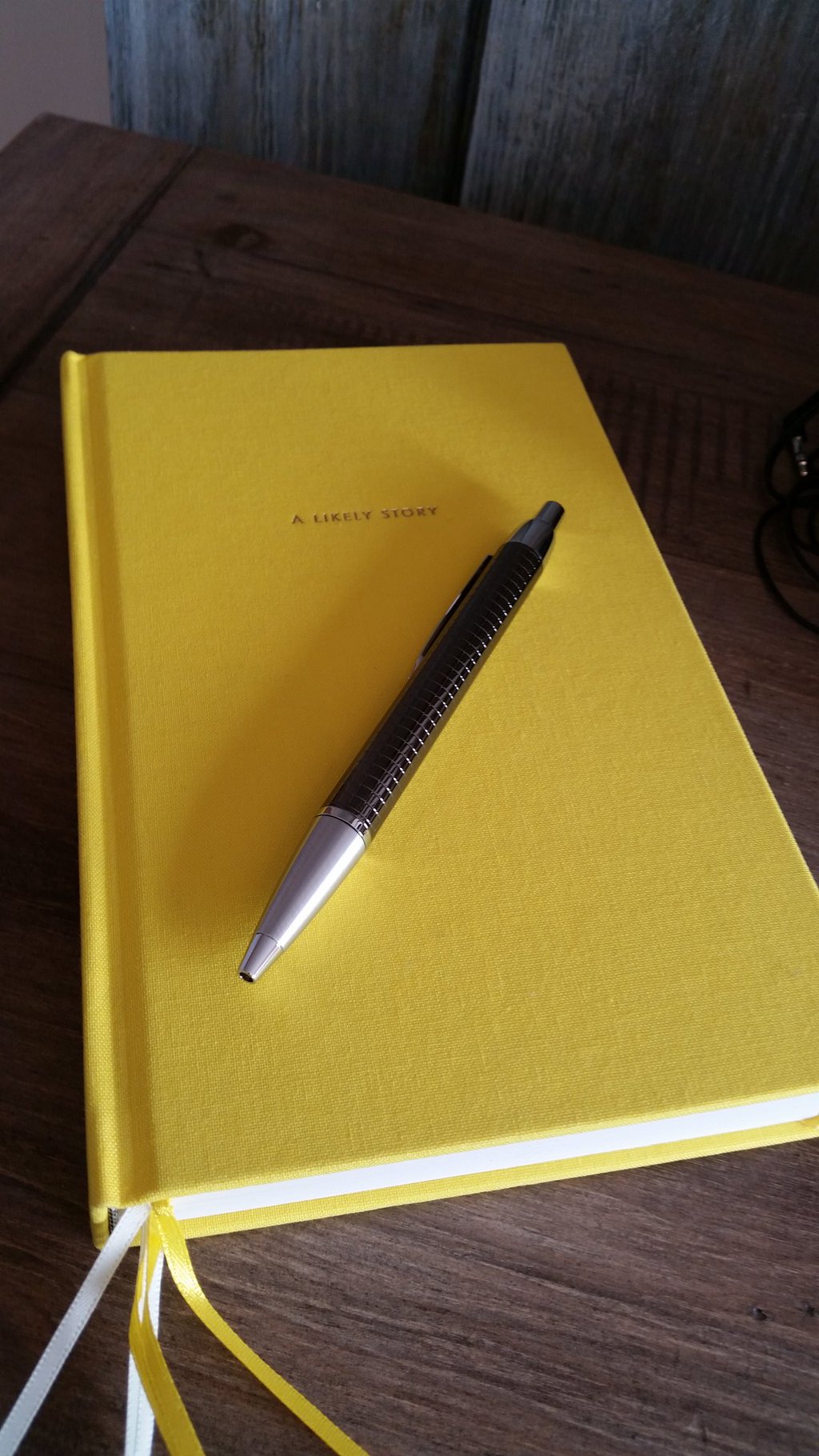 My shiny new notebook and pen